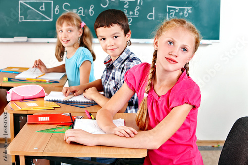 Photo: School children girl and boy. School children girl and boy.
