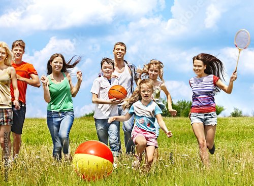 Photo: Group people with children running. Group people with children running.