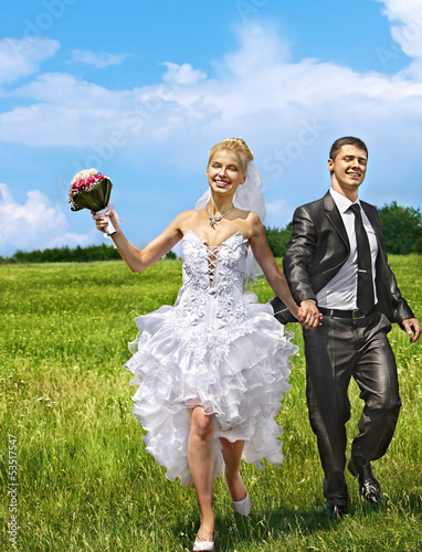 Photo: Bride and groom summer outdoor. Bride and groom summer outdoor.