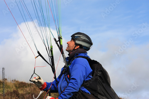 Photo: paraglider launching wing paraglider launching wing