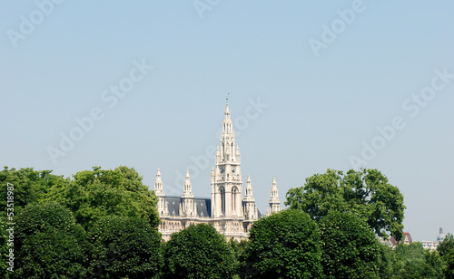 Photo: Vienna City Hall beyond the trees in Heldenplatz, Austria Vienna City Hall beyond the trees in Heldenplatz, Austria