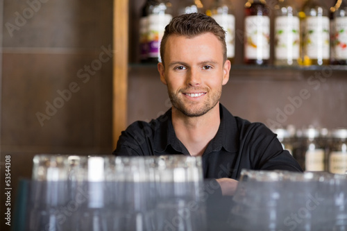 Photo: Handsome Male Barista At Coffeeshop Handsome Male Barista At Coffeeshop