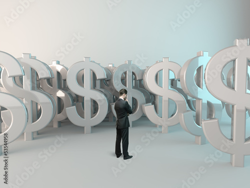 Photo: man looking at dollar man looking at dollar