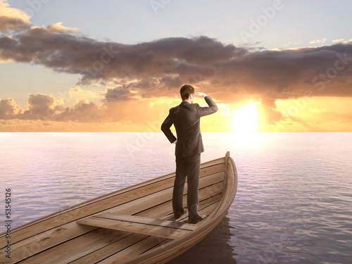 Photo: man looking on sunrise man looking on sunrise