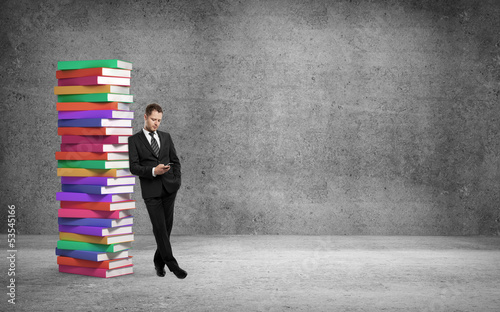 Photo: businessman and books businessman and books