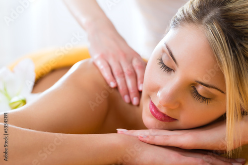 Photo: Wellness - woman getting body massage in Spa Wellness - woman getting body massage in Spa