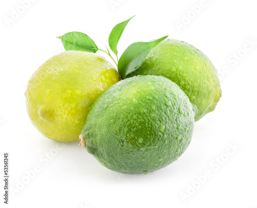 Photo: Fresh lime with leaves, Isolated on white background Fresh lime with leaves, Isolated on white background