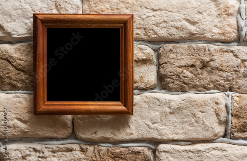 Photo: photo frame on brick wall photo frame on brick wall