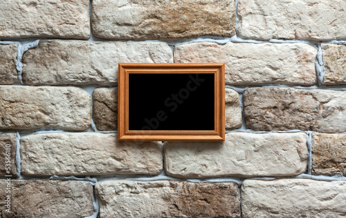 Photo: photo frame on brick wall photo frame on brick wall