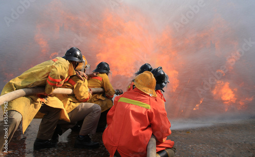 Photo: Firefighters fighting fire Firefighters fighting fire
