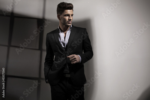 Photo: Handsome man in business pose Handsome man in business pose