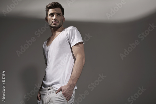 Photo: Muscular handsome man wearing spring clothes Muscular handsome man wearing spring clothes