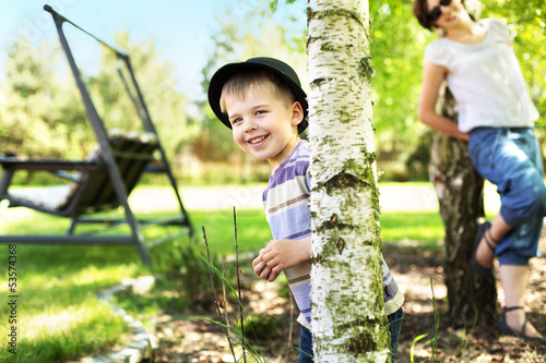 Photo: Glad mother staring at her cute son Glad mother staring at her cute son