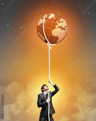 Photo: Image of businessman climbing rope Image of businessman climbing rope
