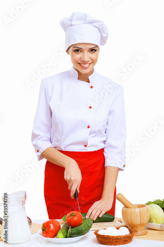 Photo: Young cook preparing food Young cook preparing food