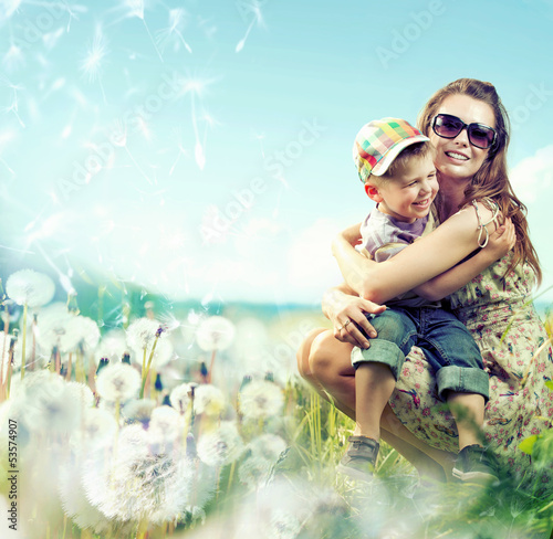 Photo: Pretty mom huging her small lovely boy Pretty mom huging her small lovely boy
