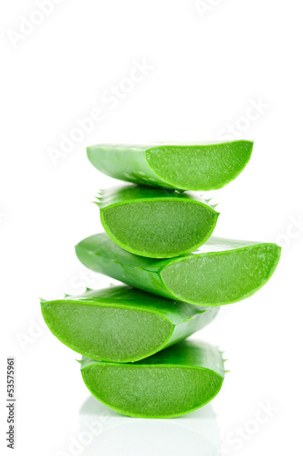Photo: Sliced aloe leaves isolated on white background Sliced aloe leaves isolated on white background
