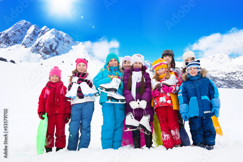 Photo: Many kids with ice skates Many kids with ice skates