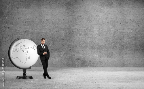 Photo: man with globe man with globe