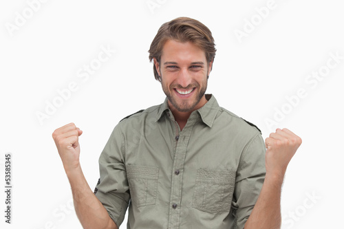 Photo: Succesful man cheering Succesful man cheering