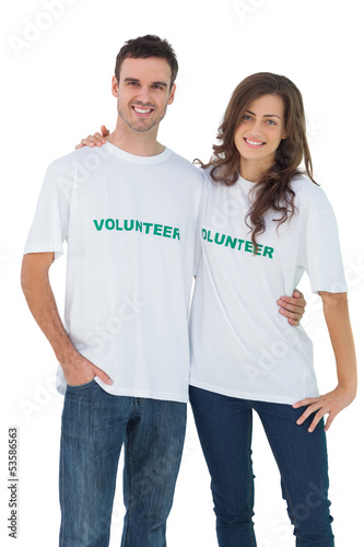 Photo: Two cheerful people wearing volunteer tshirt Two cheerful people wearing volunteer tshirt