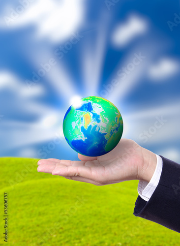 Photo: earth globe on hand earth globe on hand