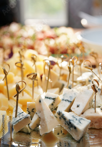 Photo: Selection of cheese on banquet table Selection of cheese on banquet table