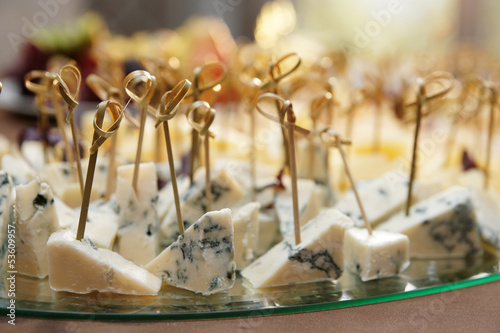 Photo: Variety of cheese on banquet table Variety of cheese on banquet table
