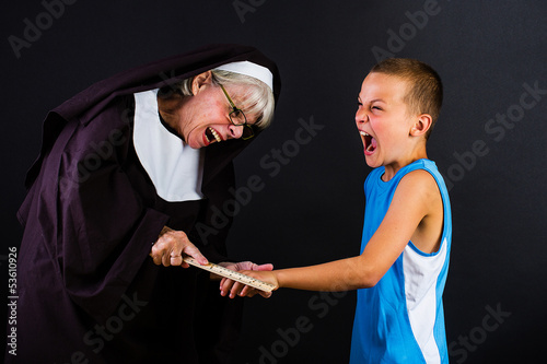 Photo: nun hitting a boy nun hitting a boy