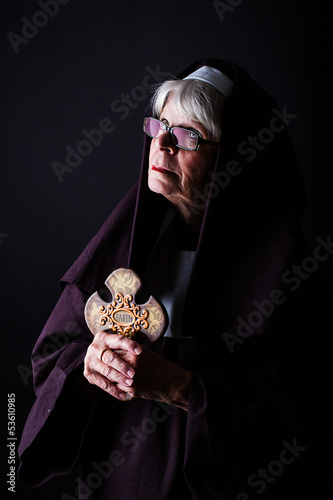 Photo: nun looking up in faith nun looking up in faith