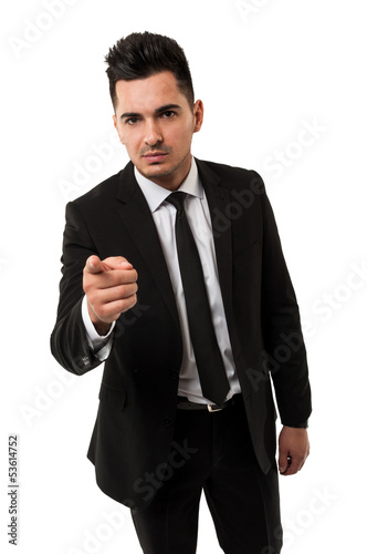Photo: Tall businessman pointing the inger at you Tall businessman pointing the inger at you