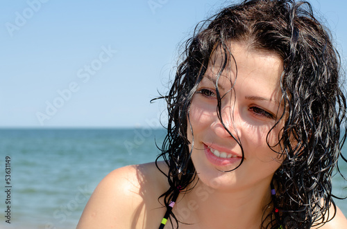 Photo: Beautiful brunette at the seaside Beautiful brunette at the seaside