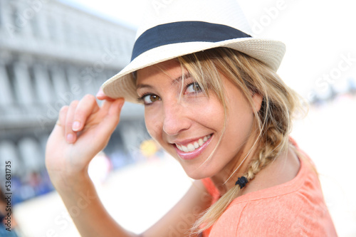 Photo: Portrait of beautiful blond girl with hat Portrait of beautiful blond girl with hat