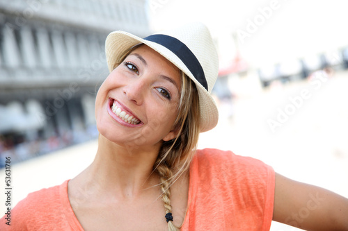 Photo: Portrait of beautiful blond girl with hat Portrait of beautiful blond girl with hat