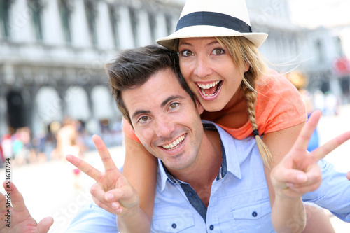 Photo: Funny couple chilling out on San Marco Place, Venice Funny couple chilling out on San Marco Place, Venice
