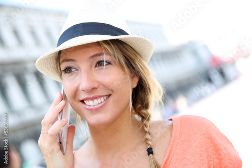 Photo: Portrait of beautiful girl talking on mobile phone Portrait of beautiful girl talking on mobile phone