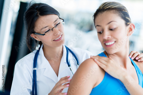 Photo: Gym doctor with a patient Gym doctor with a patient