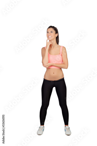 Photo: Pensive girl with sports clothes Pensive girl with sports clothes