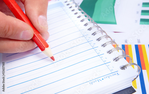 Photo: Writing business people. Writing business people.