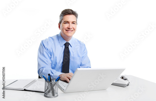 Photo: Businessman with laptop computer. Businessman with laptop computer.