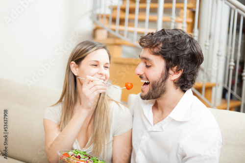 Photo: Couple eating a salad Couple eating a salad