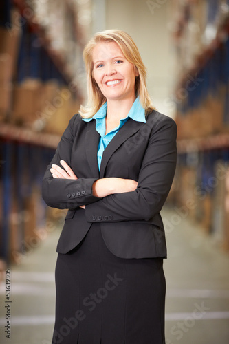 Photo: Portrait Of Female Manager In Warehouse Portrait Of Female Manager In Warehouse