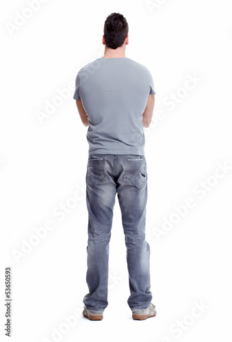 Photo: Young man looking the wall. Young man looking the wall.