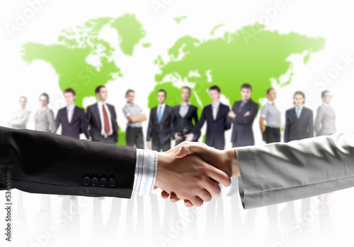 Photo: image of business handshake image of business handshake
