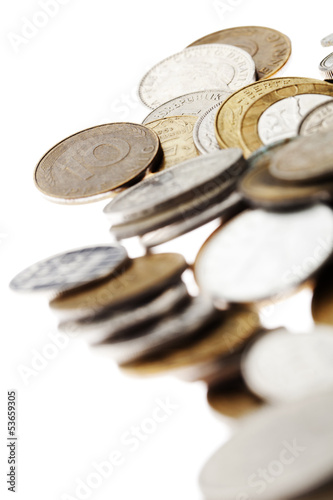 Photo: Coins Macro Background on White Coins Macro Background on White