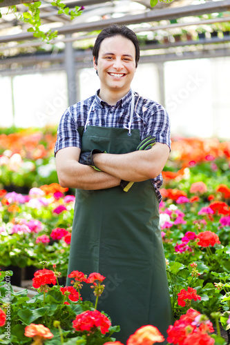 Photo: Greenhouse employee Greenhouse employee