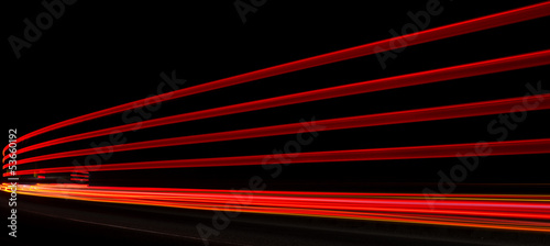 Abstract orange, red and yellow lights in road tunnel