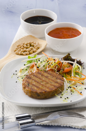 Photo: Vegetarian tofu burger. Vegetarian tofu burger.