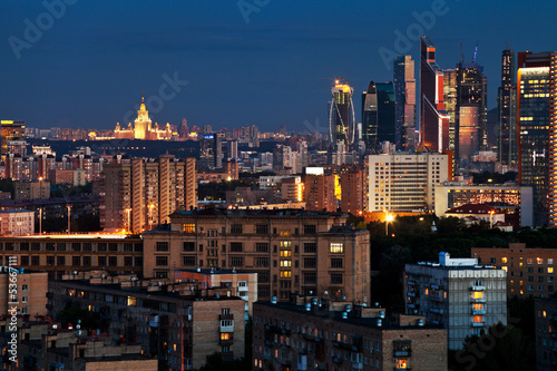 Photo: urban panorama in blue summer night urban panorama in blue summer night