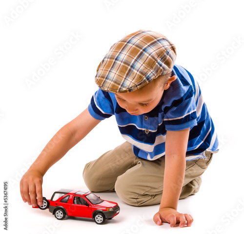 Photo: Boy and toy car Boy and toy car